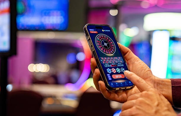wajan4d app showing live football betting markets and live-dealer casino tables
